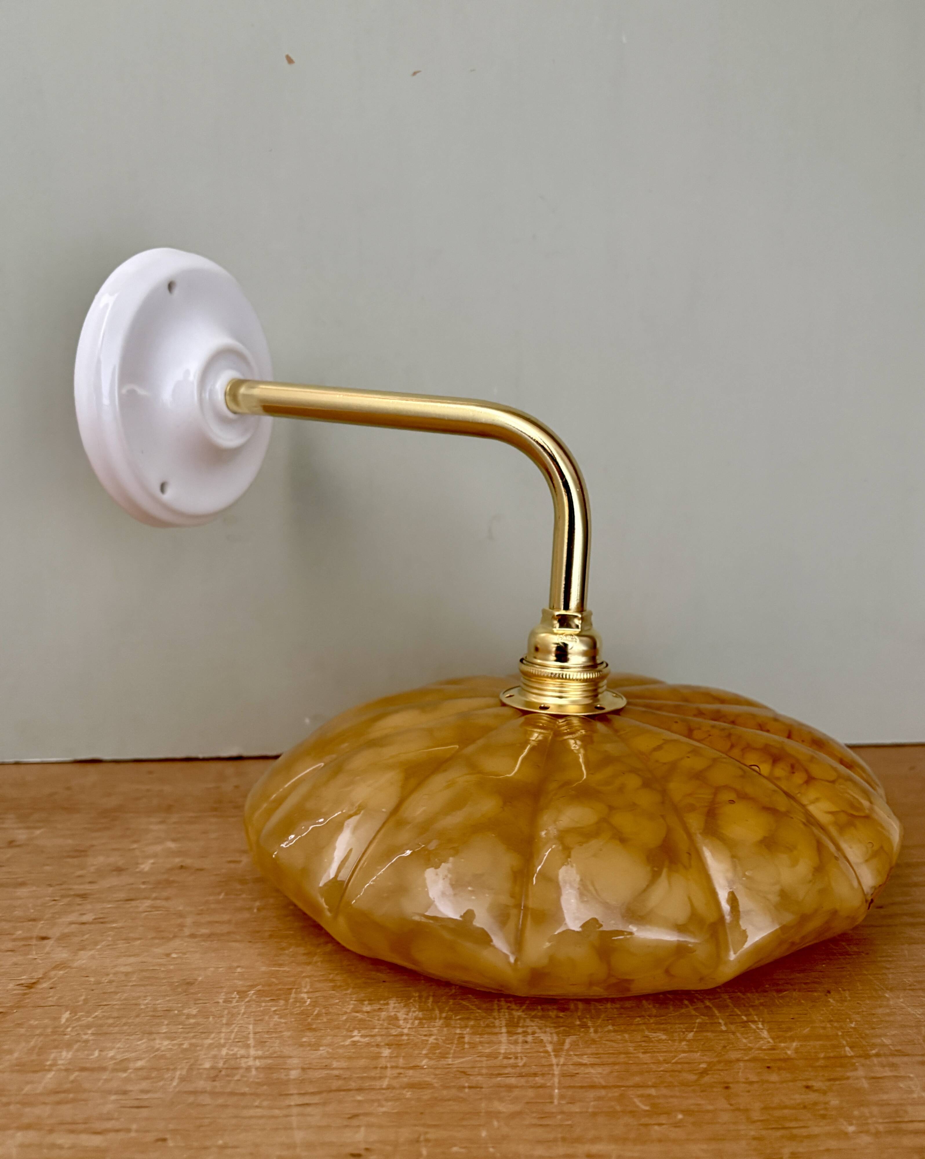 Antique wall lamp with yellow Clichy glass shade