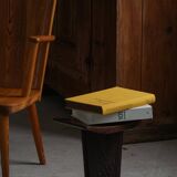 Sculptural African stool in hardwood, curved seat and architectural base, 1970s.