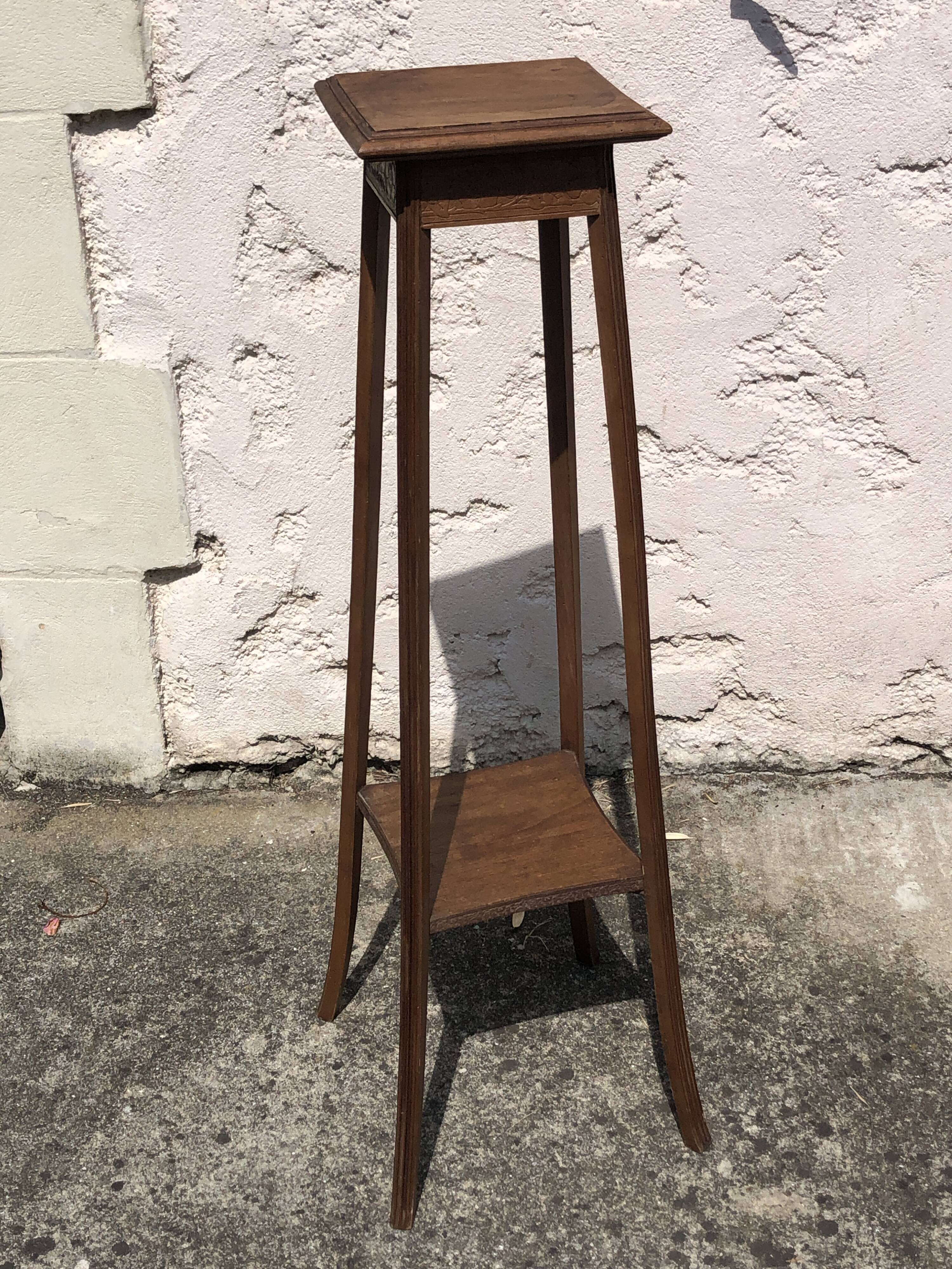 High harness in light wood, carved floral details