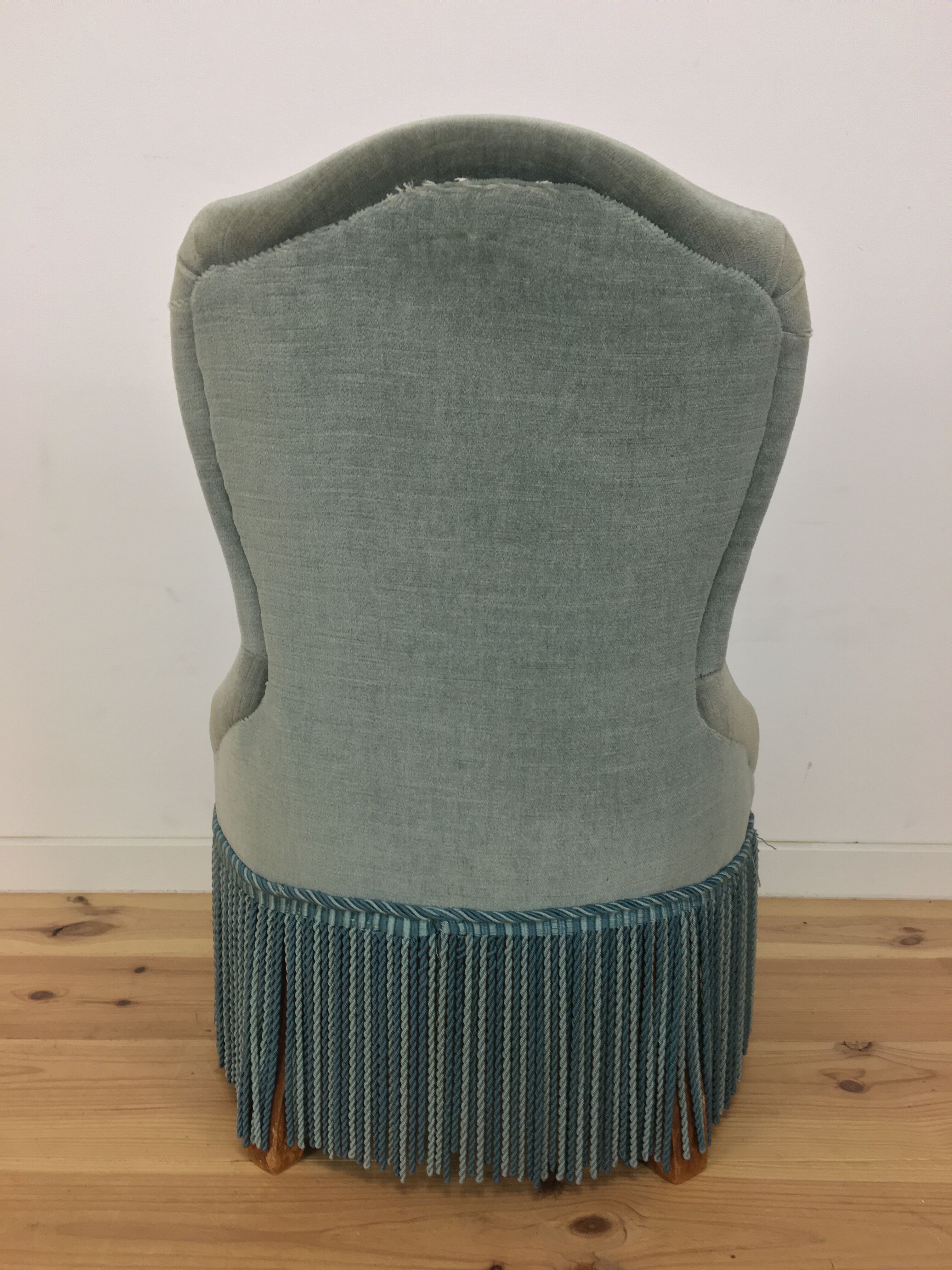 Fauteuil crapaud velours vert à franges