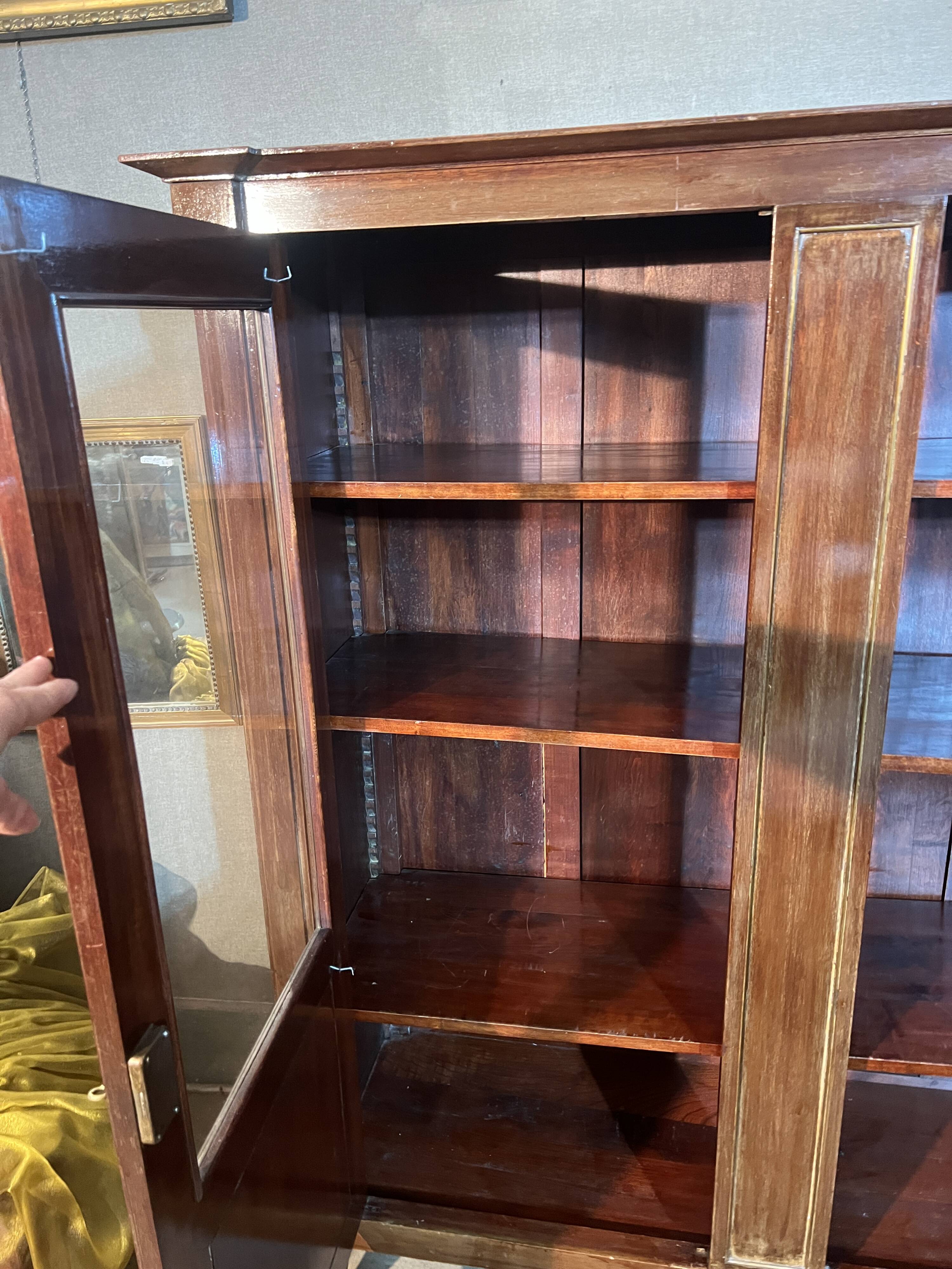 Directoire style library with two mahogany doors