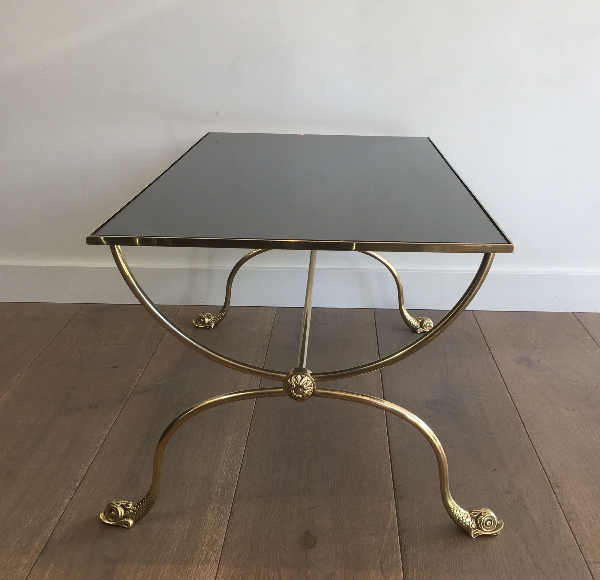 Neoclassical brass style coffee table with dolphin head decoration
