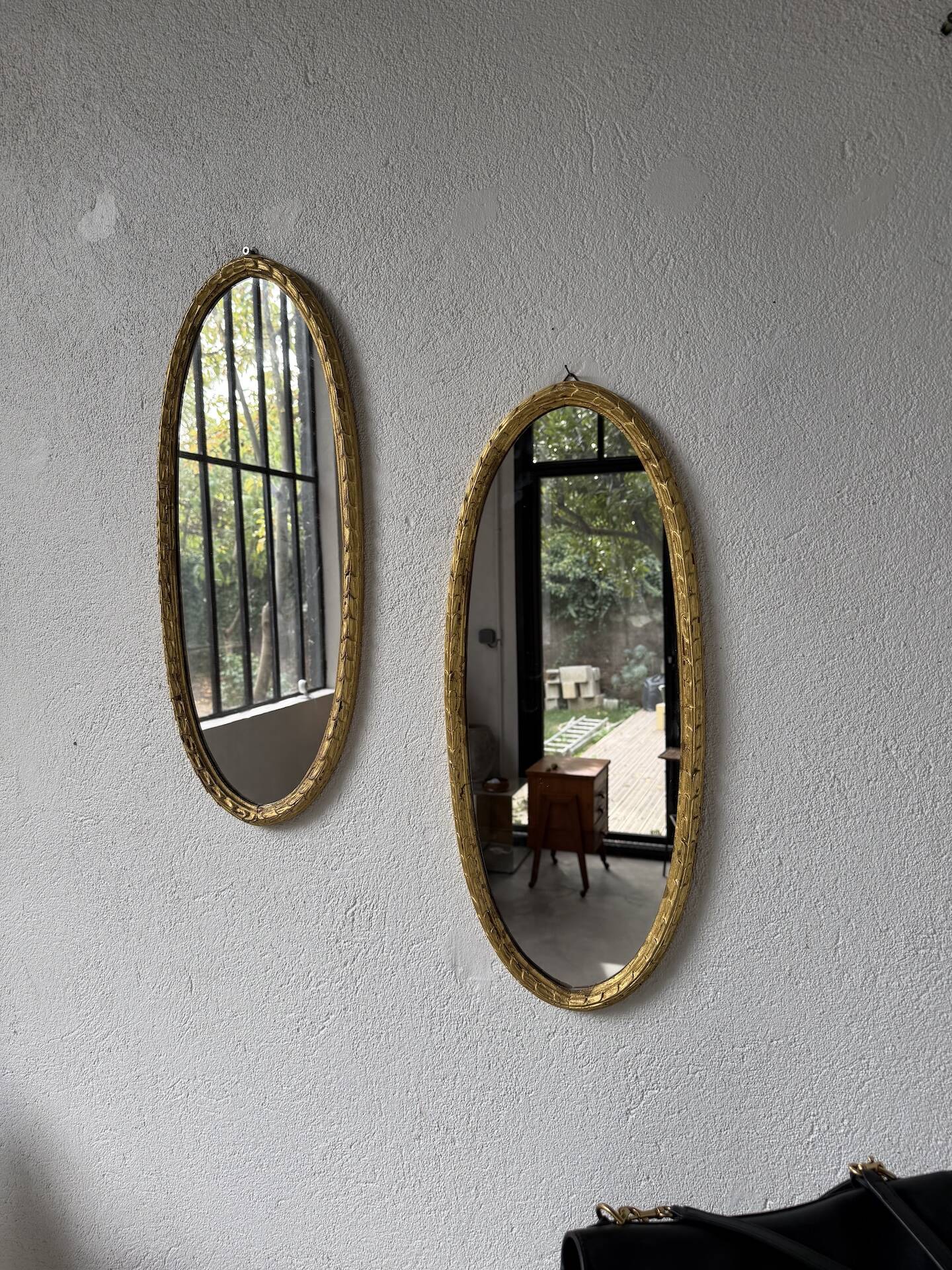 Pair of oval mirrors 1900 gilded stucco
