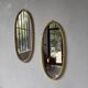 Pair of oval mirrors 1900 gilded stucco