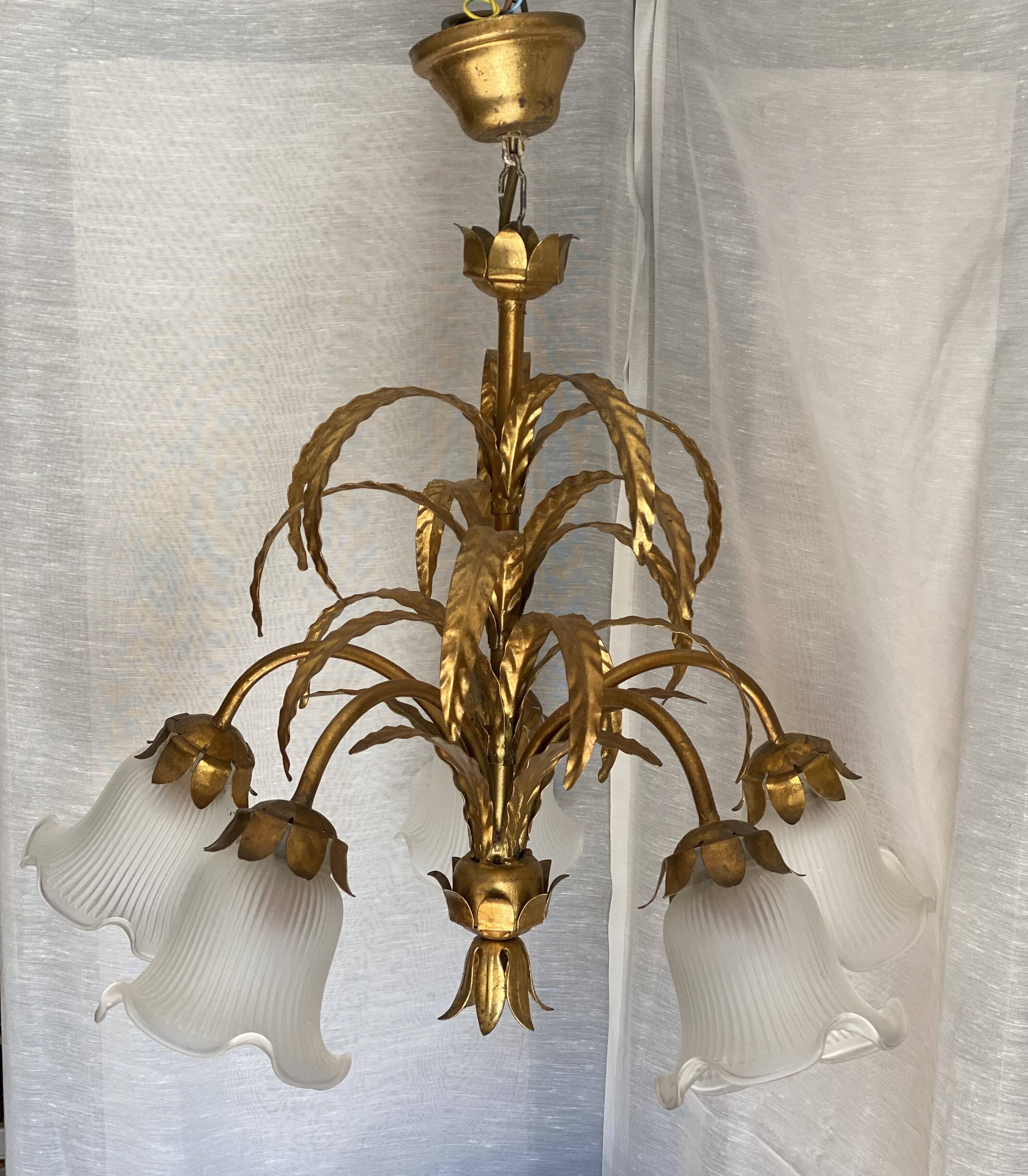 Vintage 1970s golden metal palm chandelier in the style of JANSEN.