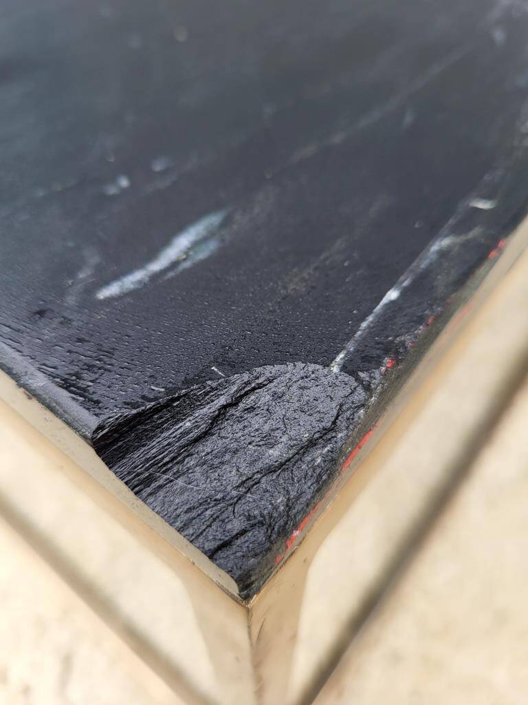 Coffee table or black marble and brass display "in its own juice"