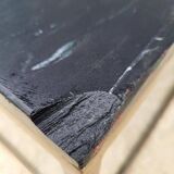 Coffee table or black marble and brass display "in its own juice"