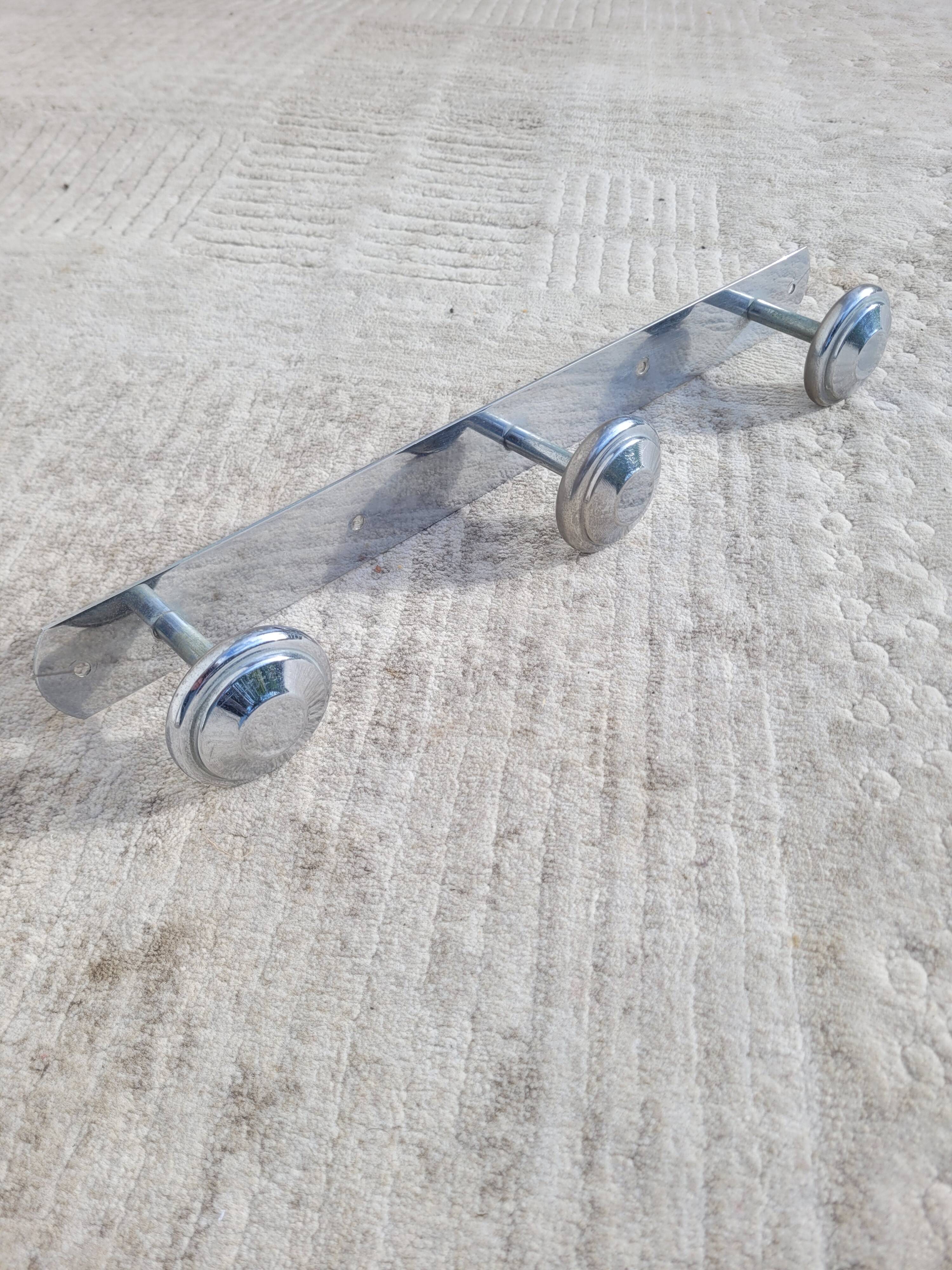 Wall-mounted coat rack circa 1950