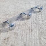 Wall-mounted coat rack circa 1950