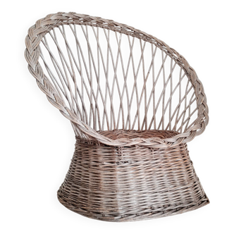 Antique armchair in gray woven wicker