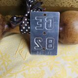 Enamelled sheet metal bicycle license plate