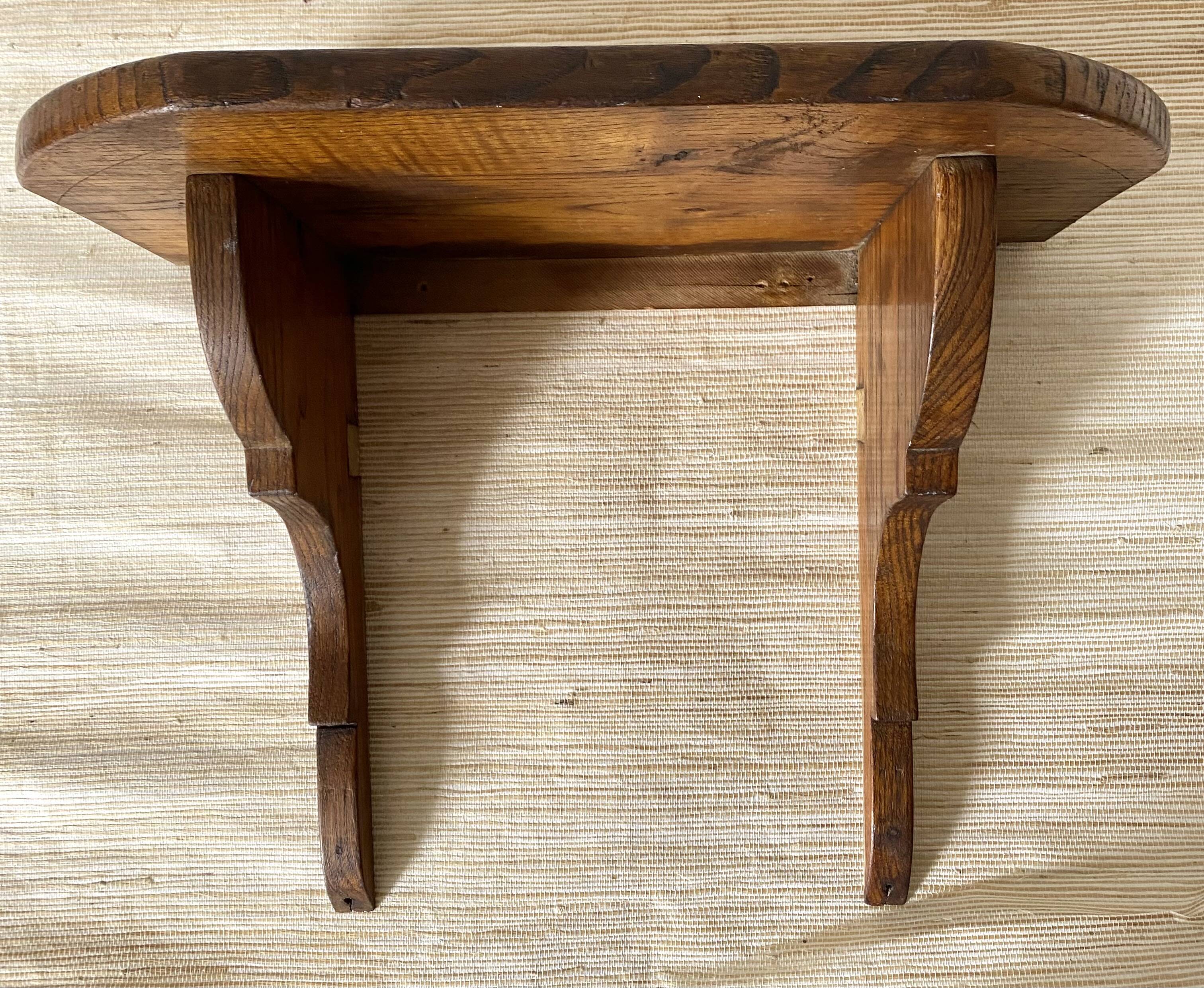 Rustic wooden wall shelf