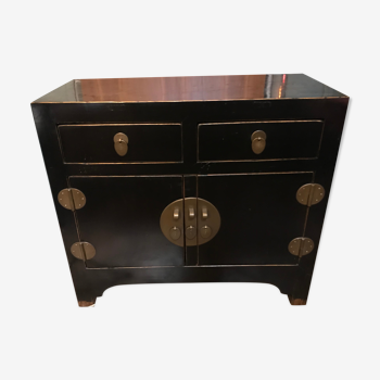 Chinese chest of drawers in black lacquer and brass