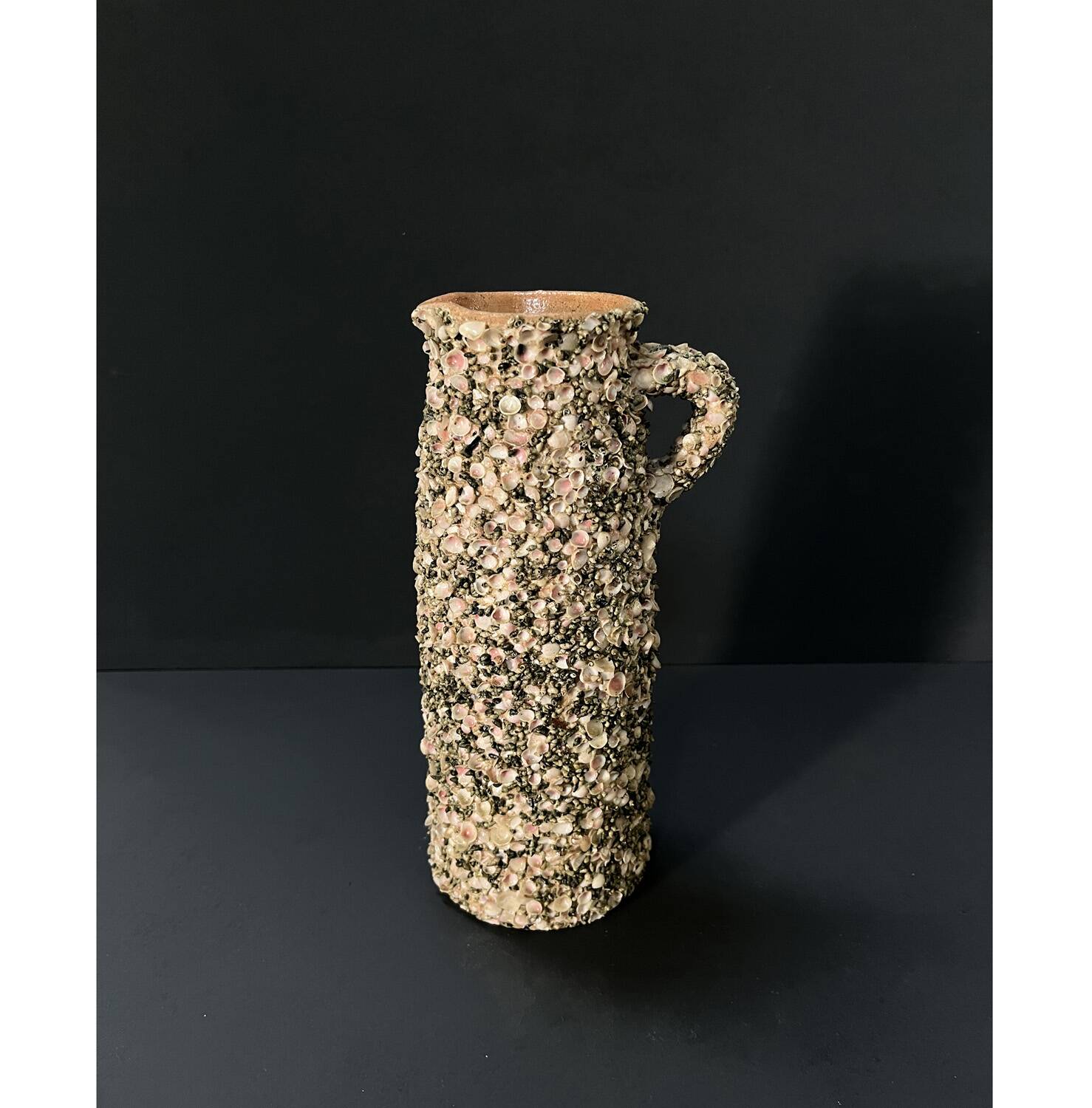 50's shell pitcher signed