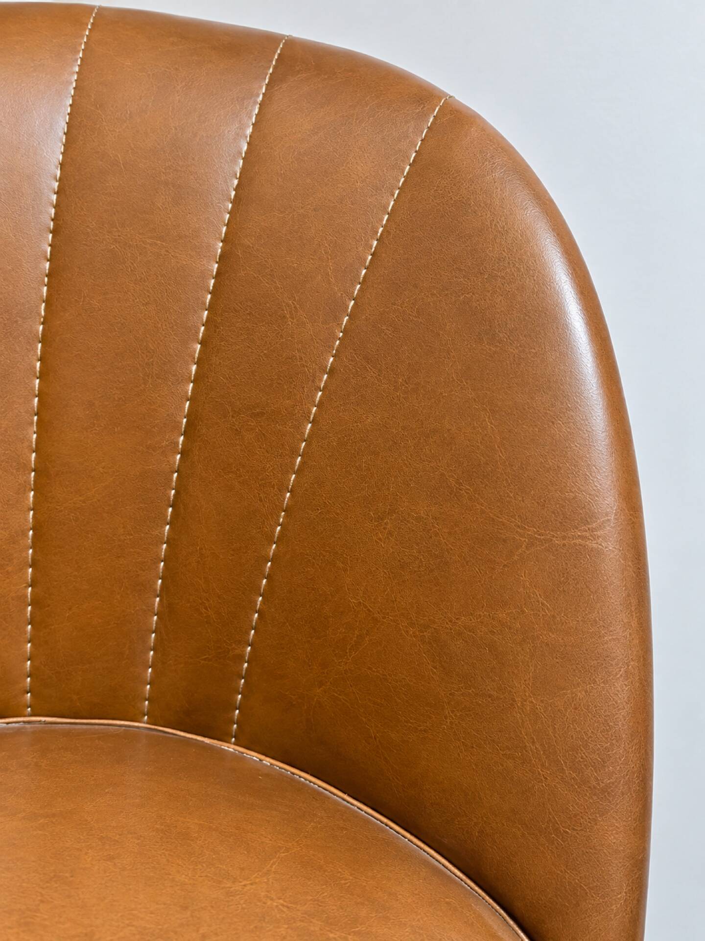 Vintage cognac fringe tub chairs