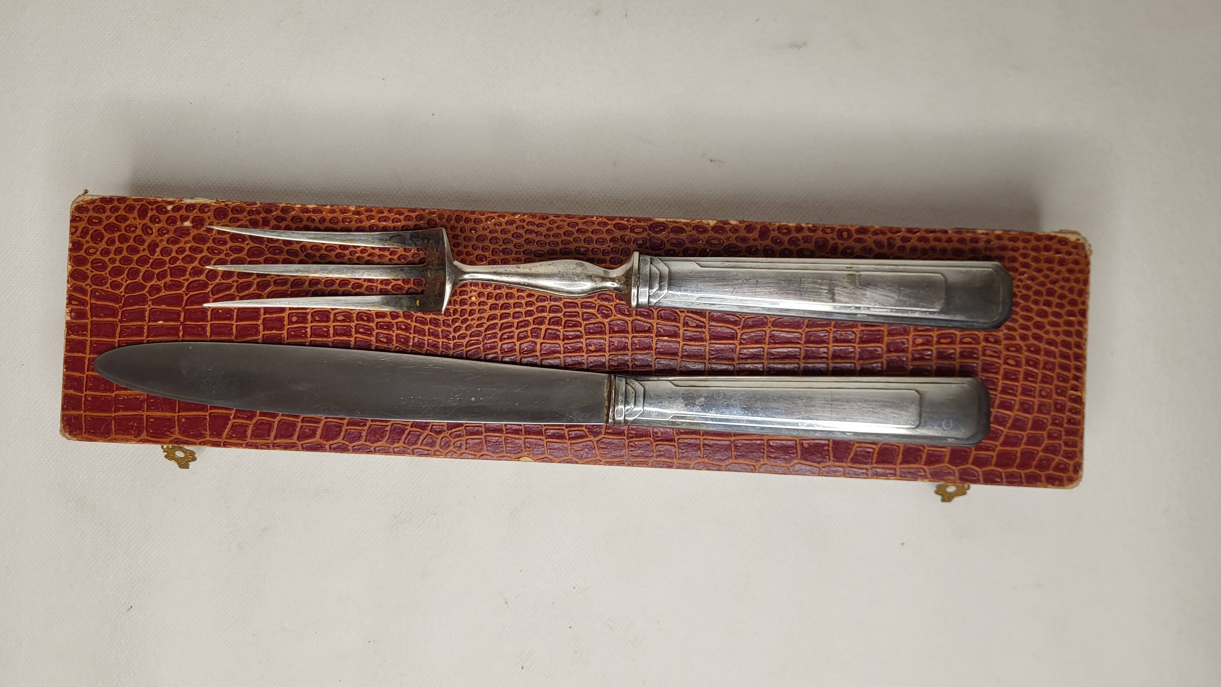 Art Deco silver plated lamb cutlery