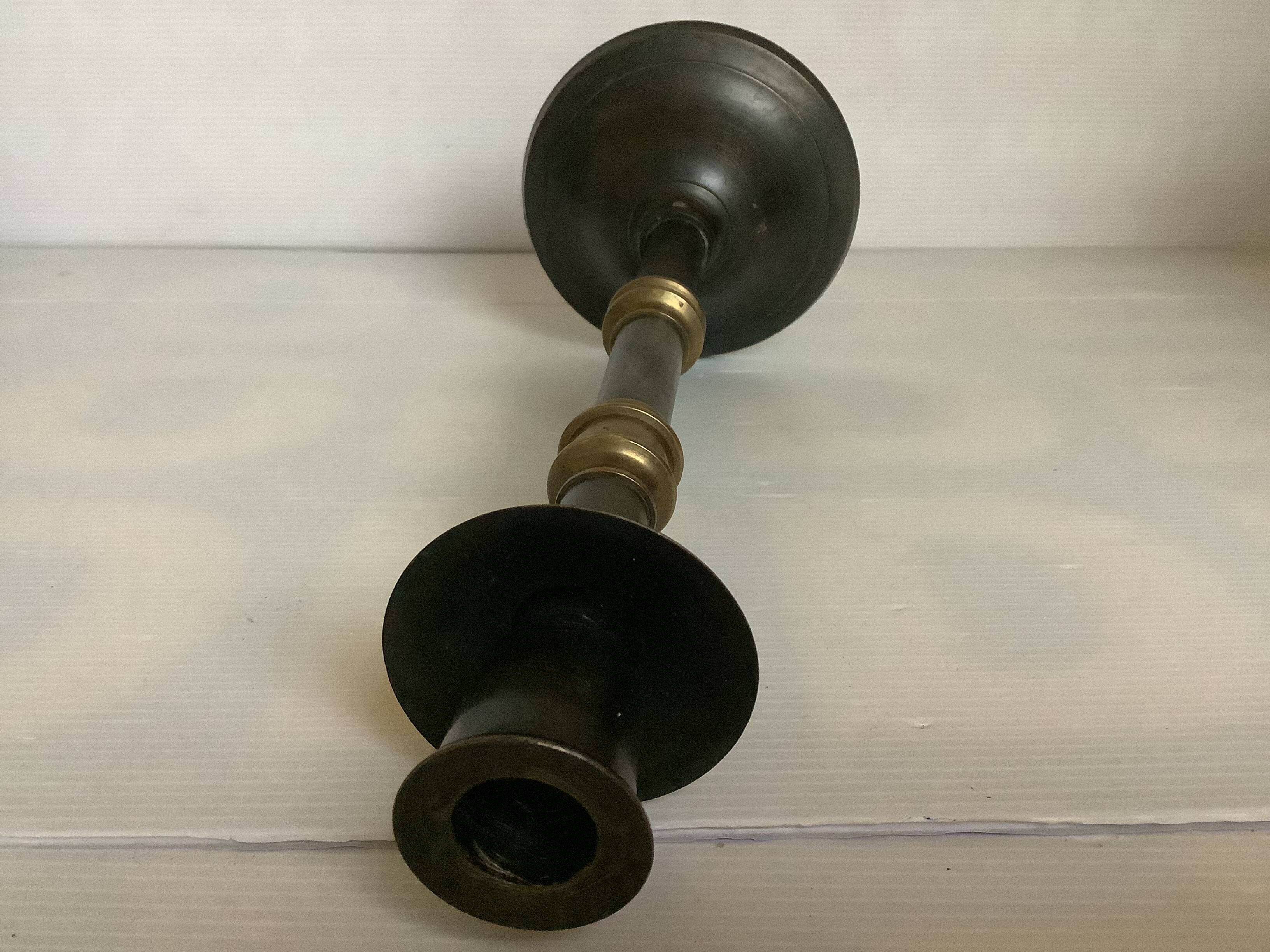 Large candlestick made of sheet metal and brass