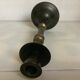 Large candlestick made of sheet metal and brass