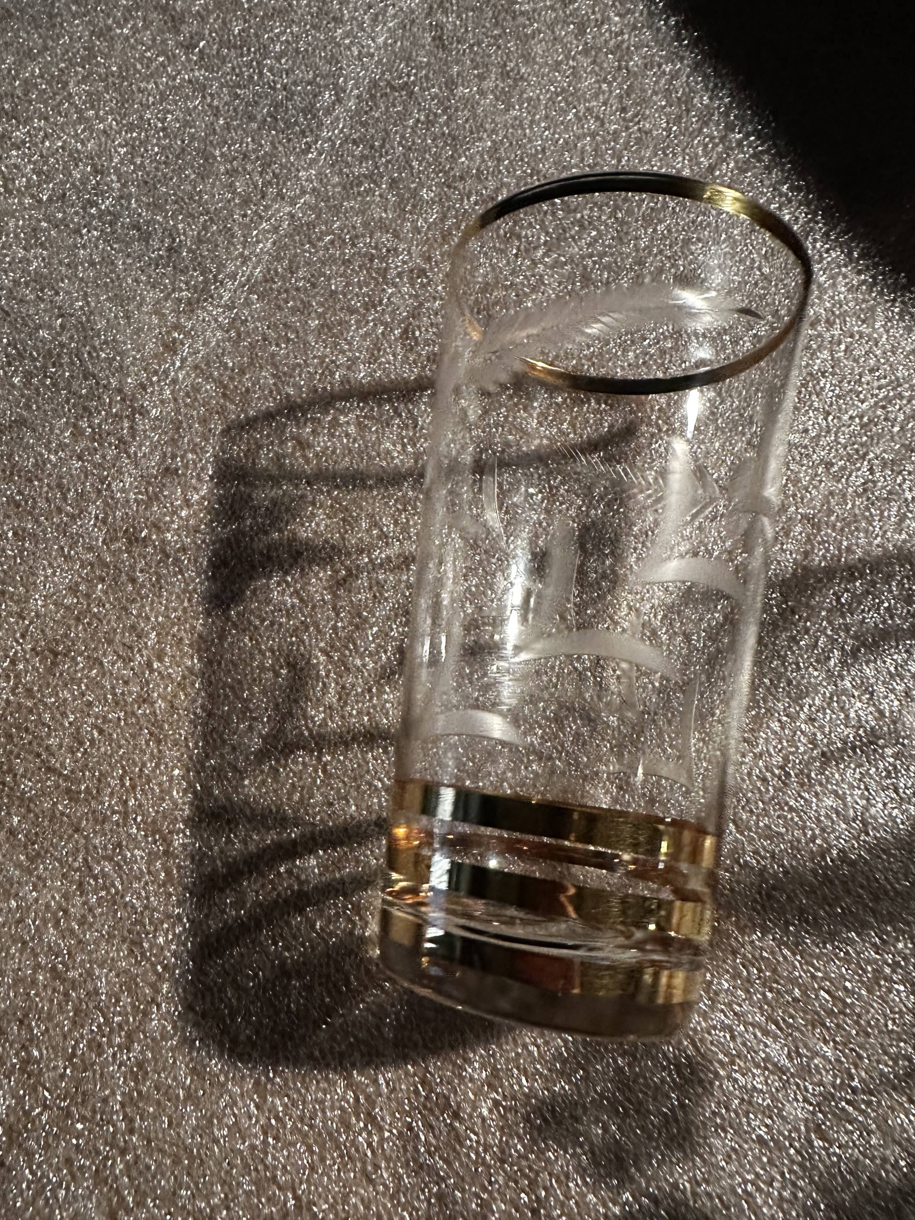 9 art-deco glasses in engraved crystal with gold trim