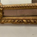 Miroir à pare-closes en bois et stuc doré Napoléon III XIX siècle