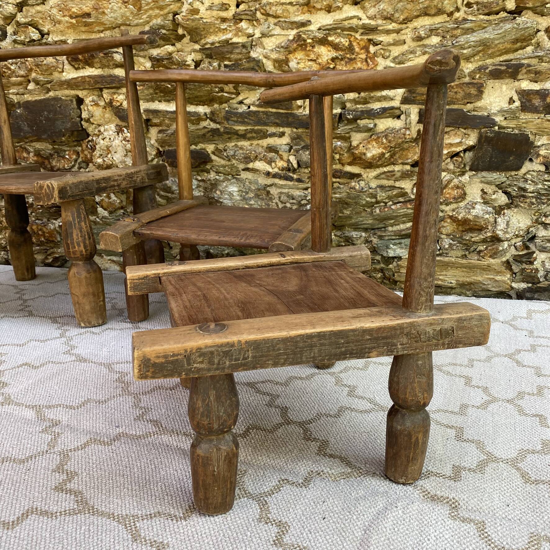 Ancient Baoulé African chairs in carved wood, Wabi-Sabi.