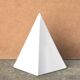 Minimalist white ceramic pyramid sculpture, 1970s.