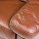 Royal 2-seater canapé premium Poltrona Frau Petronio upholstered in down and chestnut leather.