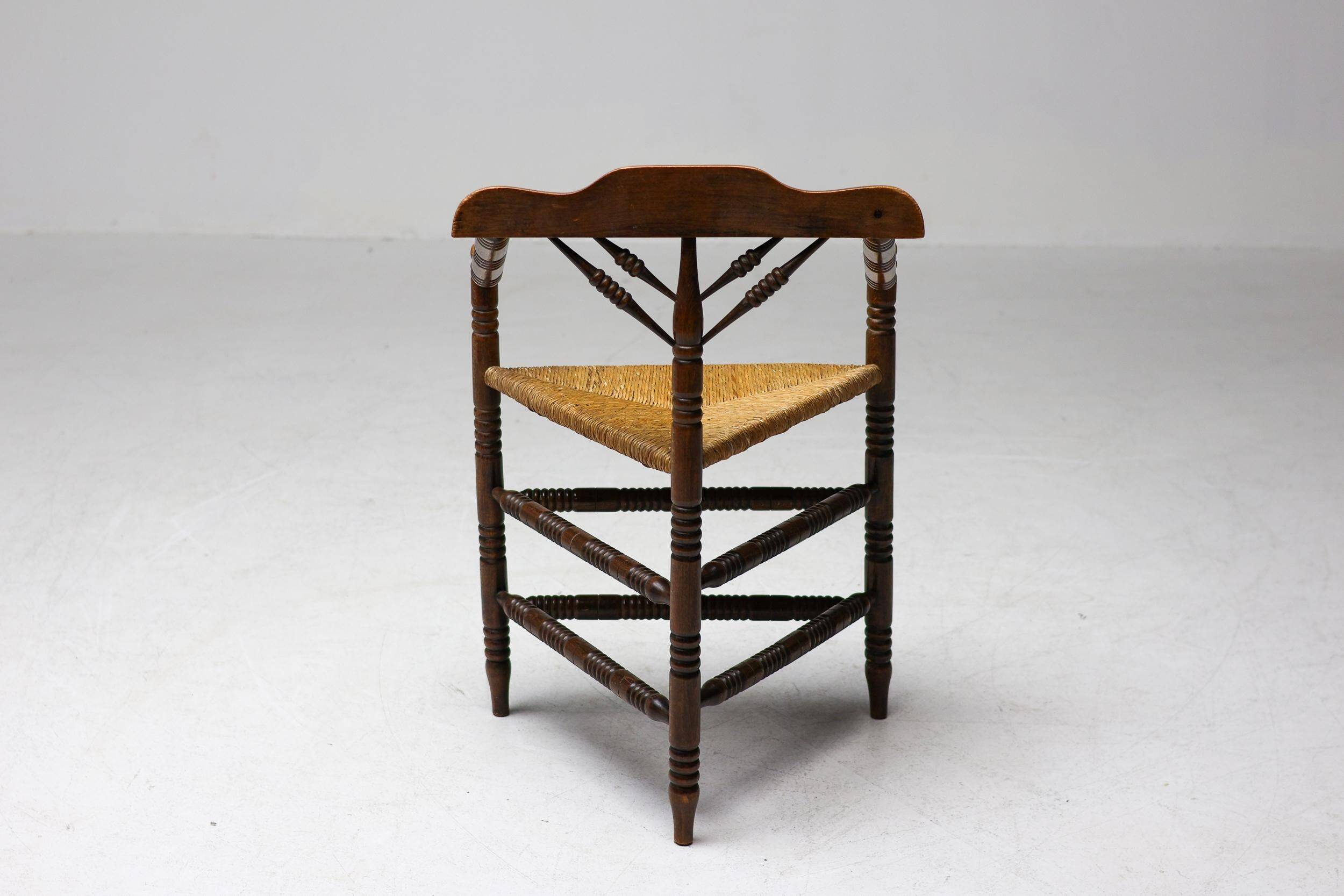 Mid Century Antiques spindle wood chaise with a rush seat.