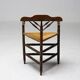 Mid Century Antiques spindle wood chaise with a rush seat.
