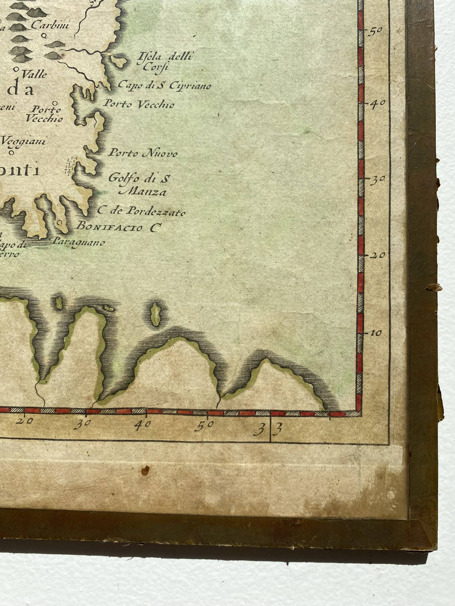 Old map of the Isle of Corsica framed under glass