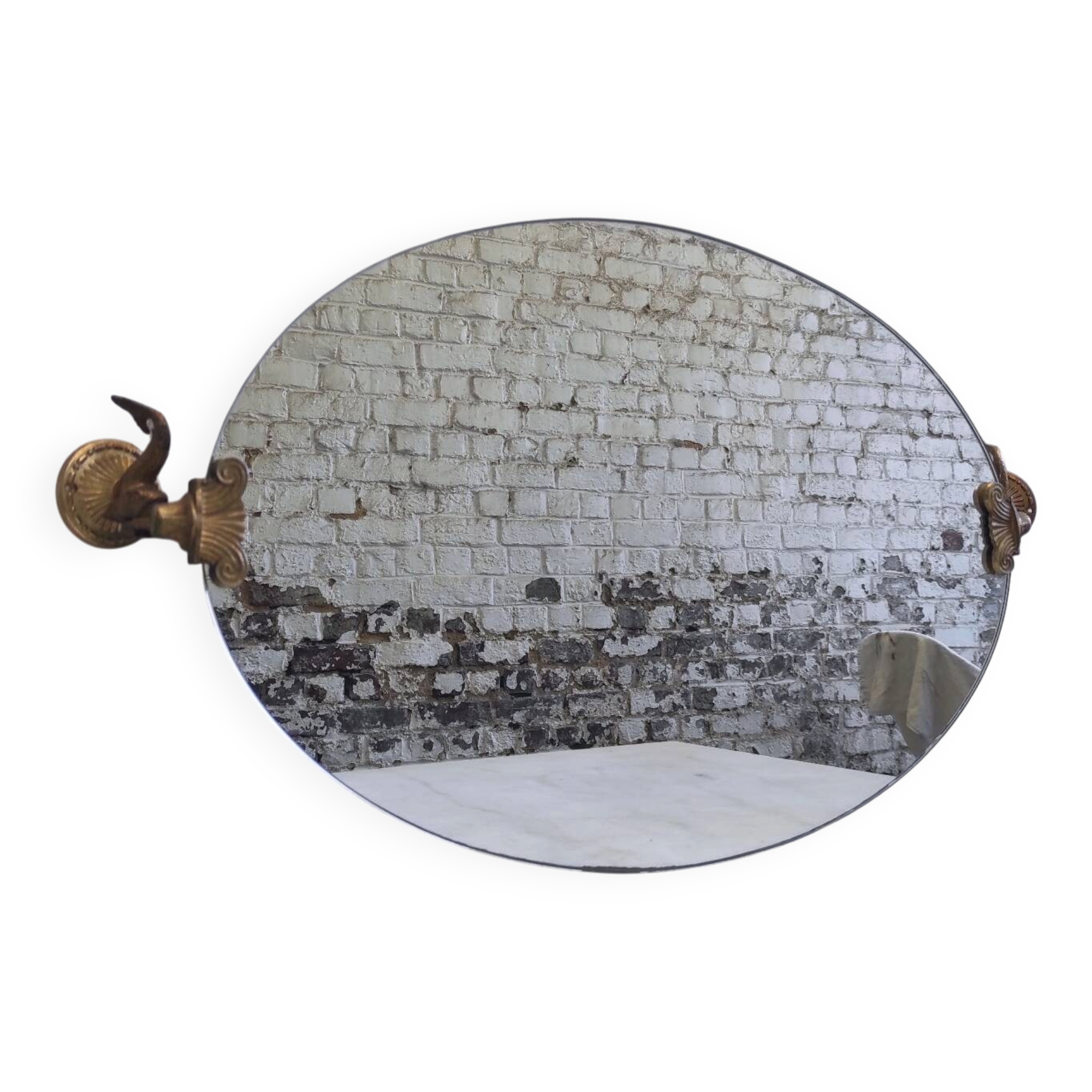 Vintage oval pivoting mirror in gilded brass with dolphins / Barber