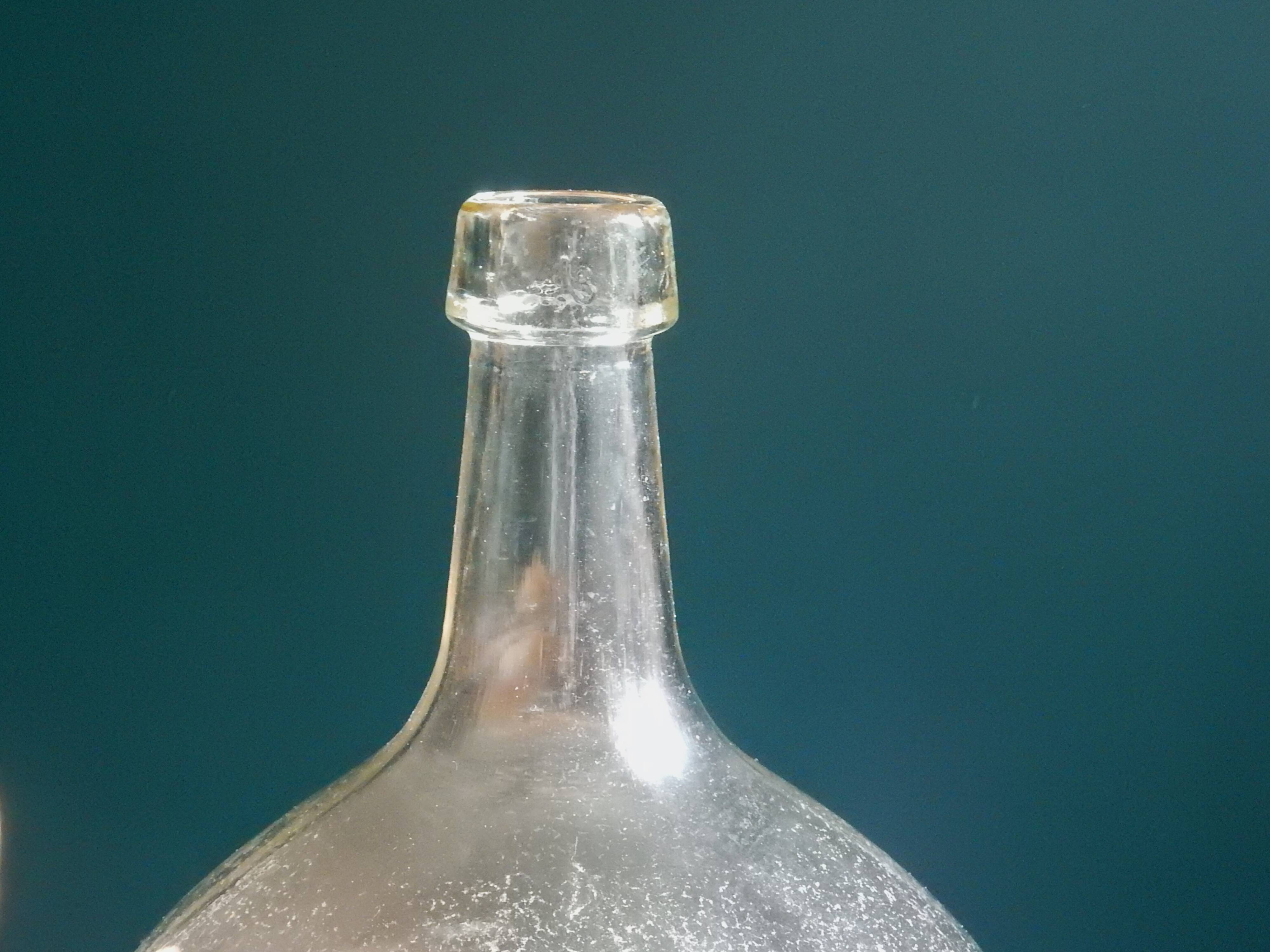 Demijohn in clear colorless glass