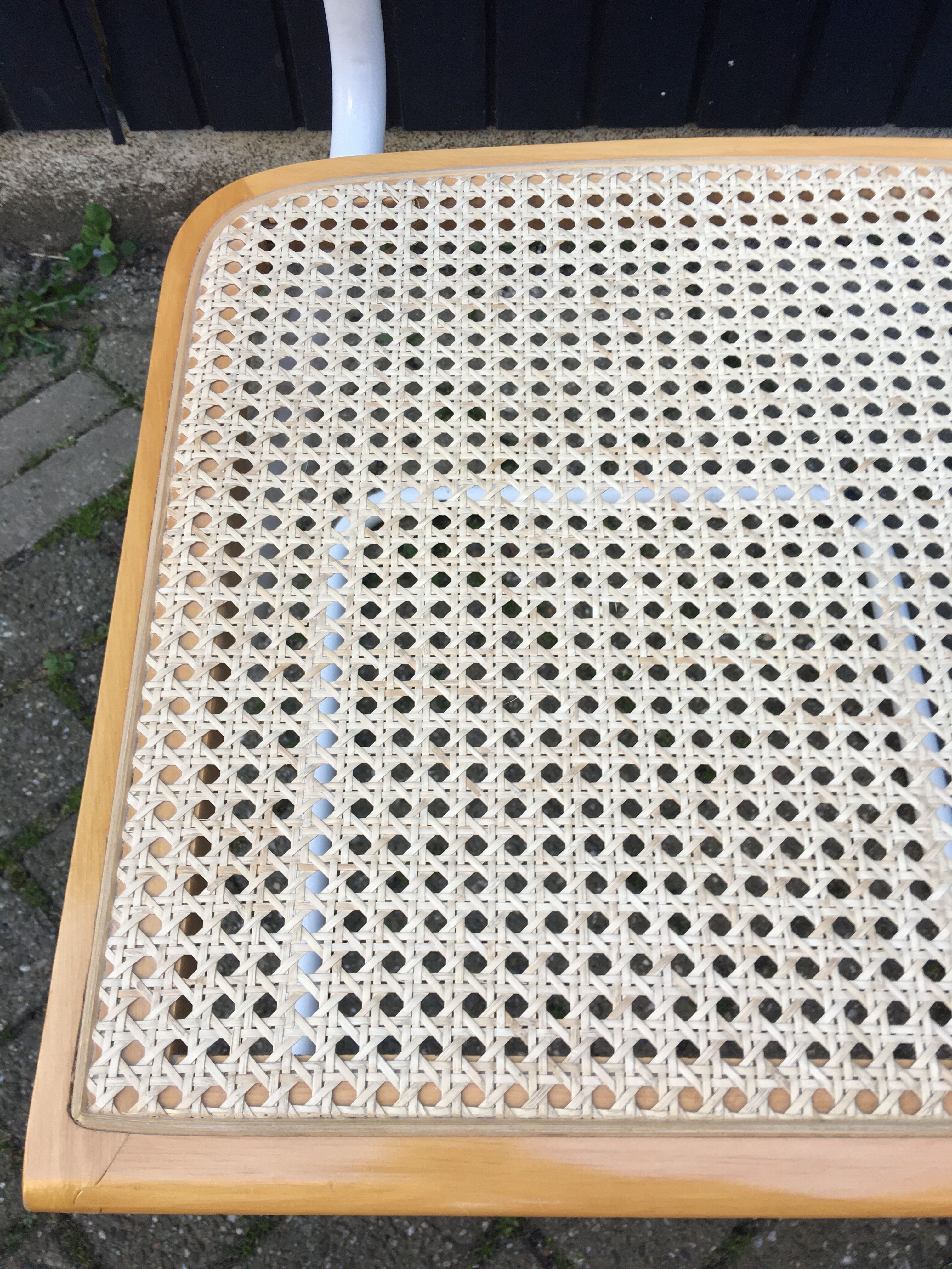 Marcel Breuer's white S64 armchairs