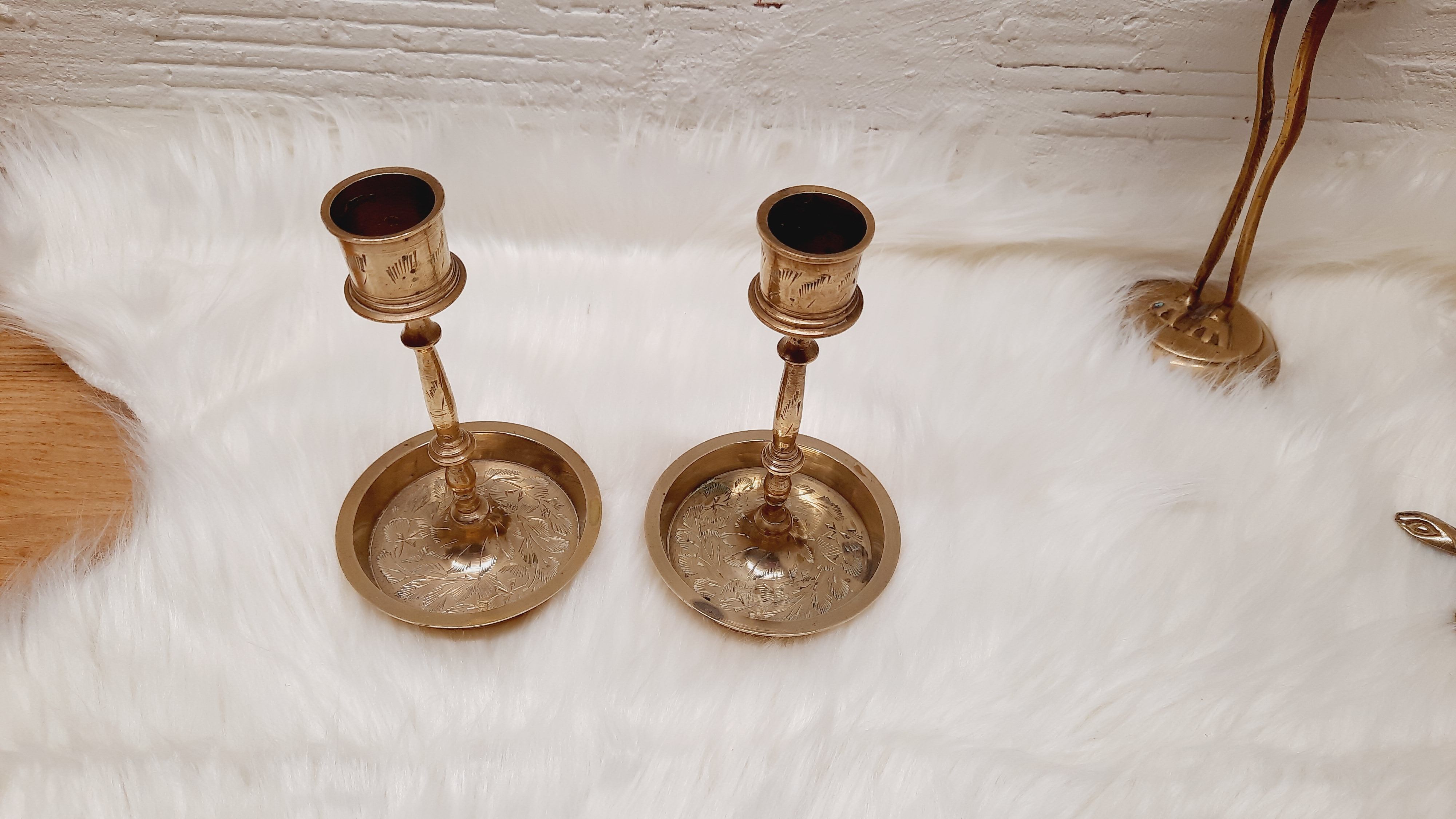 Pair chiseled brass candlesticks