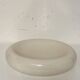 Empty pocket, cracked ceramic dish 1980