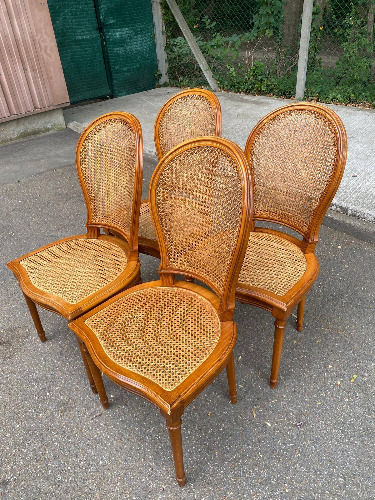 4 caned Louis XVI medallion dining chairs from the 1960s.