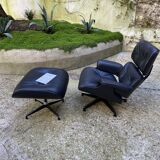 Charles Eames all-black lounge chair and ottoman, Herman Miller edition