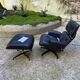 Charles Eames all-black lounge chair and ottoman, Herman Miller edition