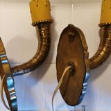 A set of wall lamps in solid brass
