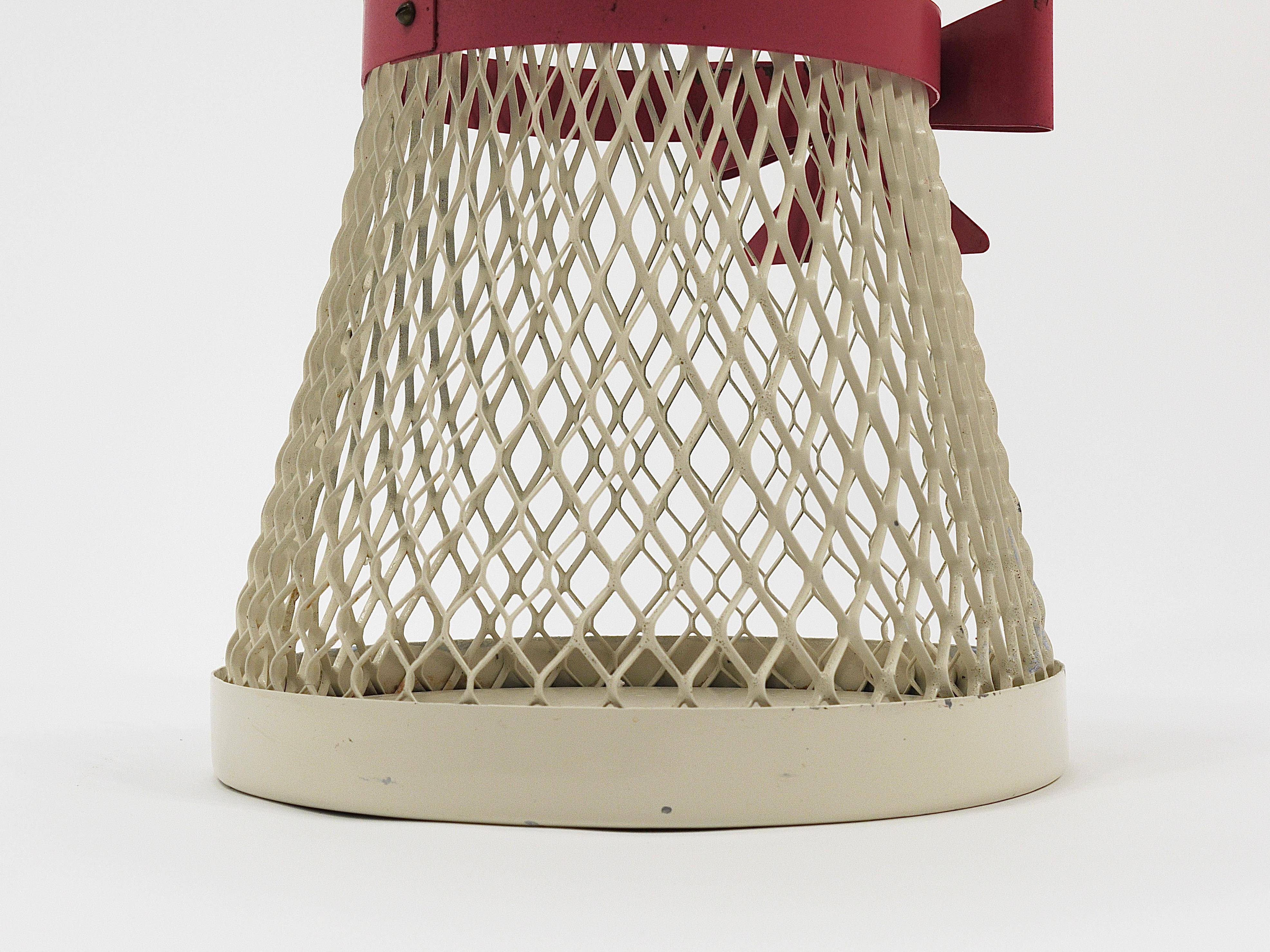 Bow tie umbrella stand in the style of Mathieu Matégot, mid-century, metal, France, 1950s.