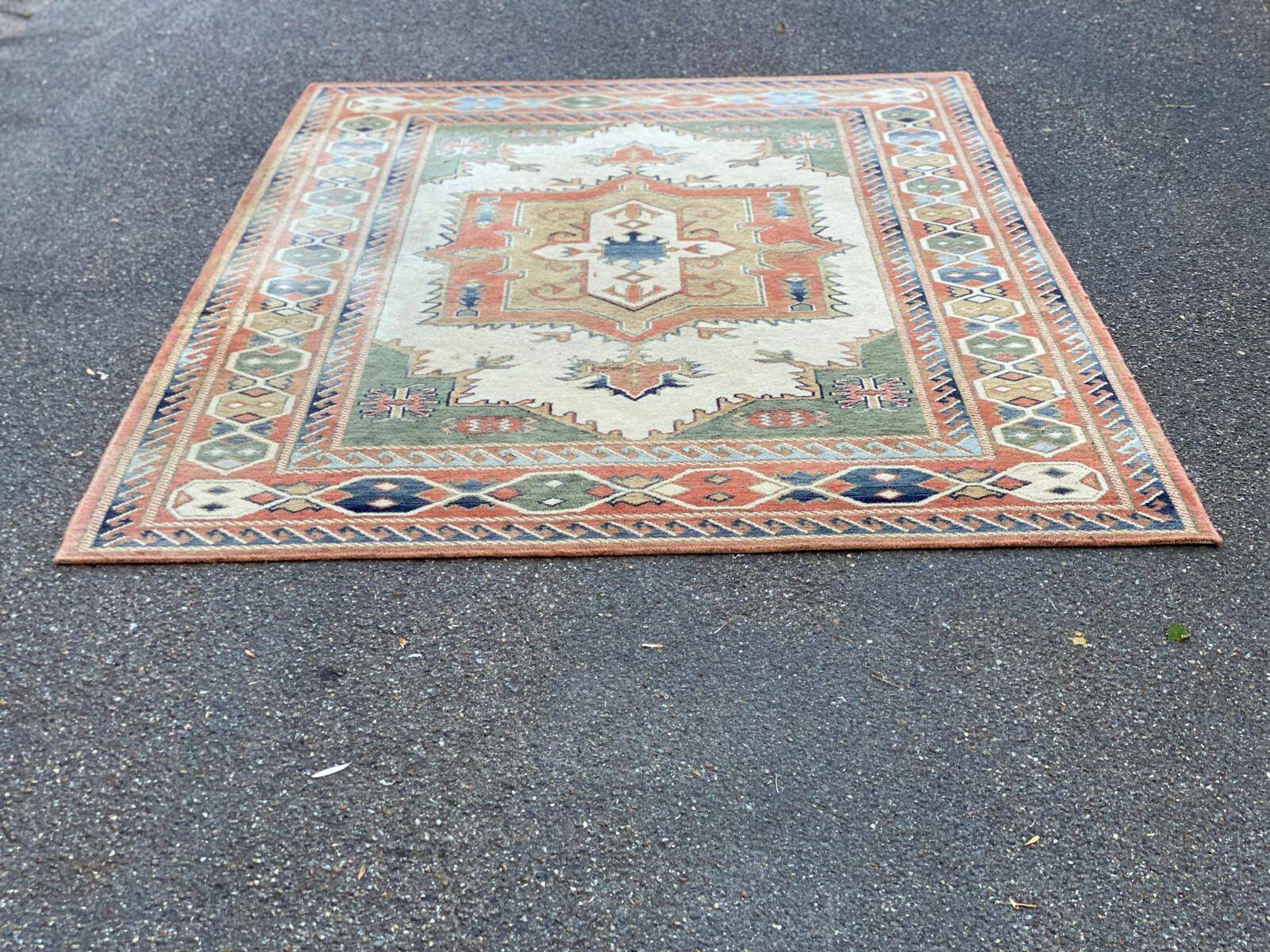 Large oriental wool rug with terracotta geometric patterns 200x300cm