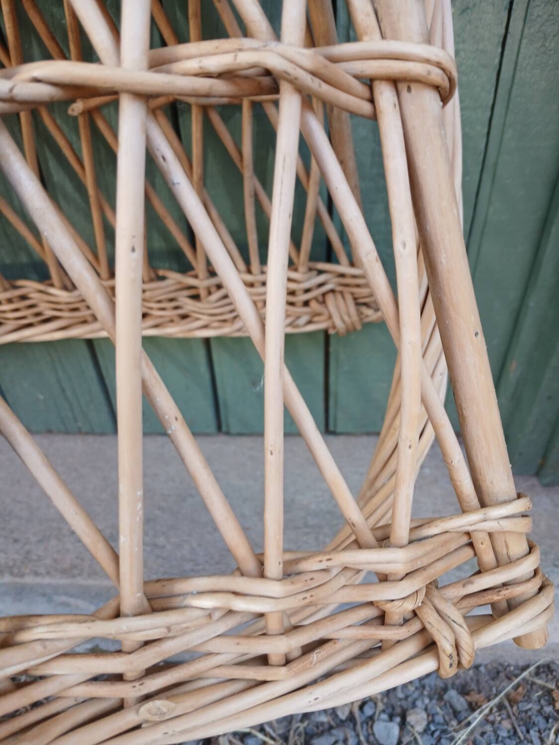 Antique wicker magazine rack