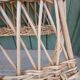 Antique wicker magazine rack
