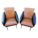 Paire de fauteuils en simili cuir