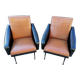 Paire de fauteuils en simili cuir