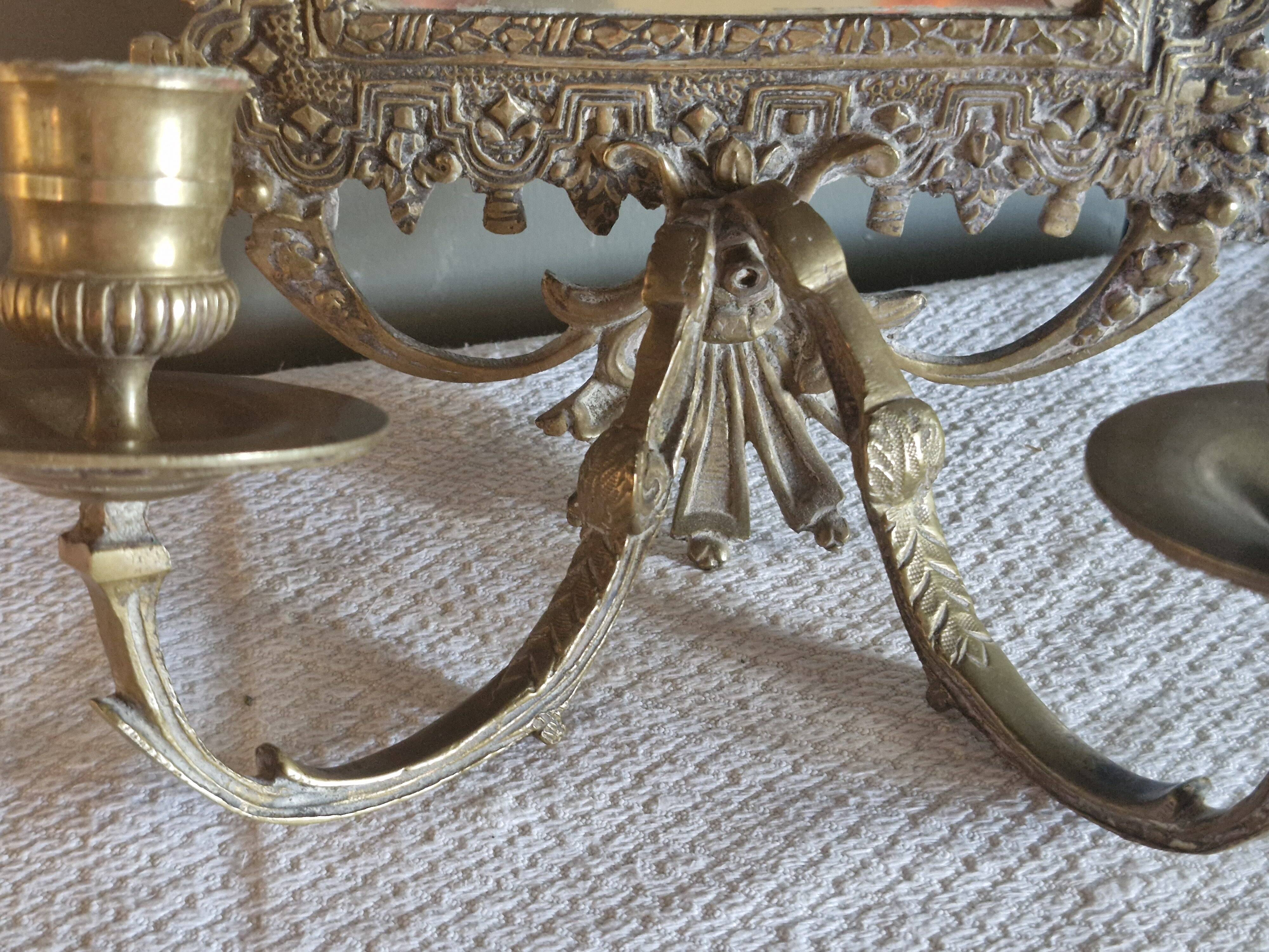 Pair of mirror sconces/candle holders in 19th-century bronze.