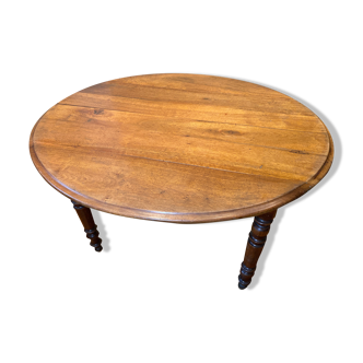 Table with oval shutter in walnut foot turned