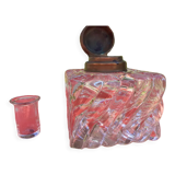 Old inkwell in molded glass