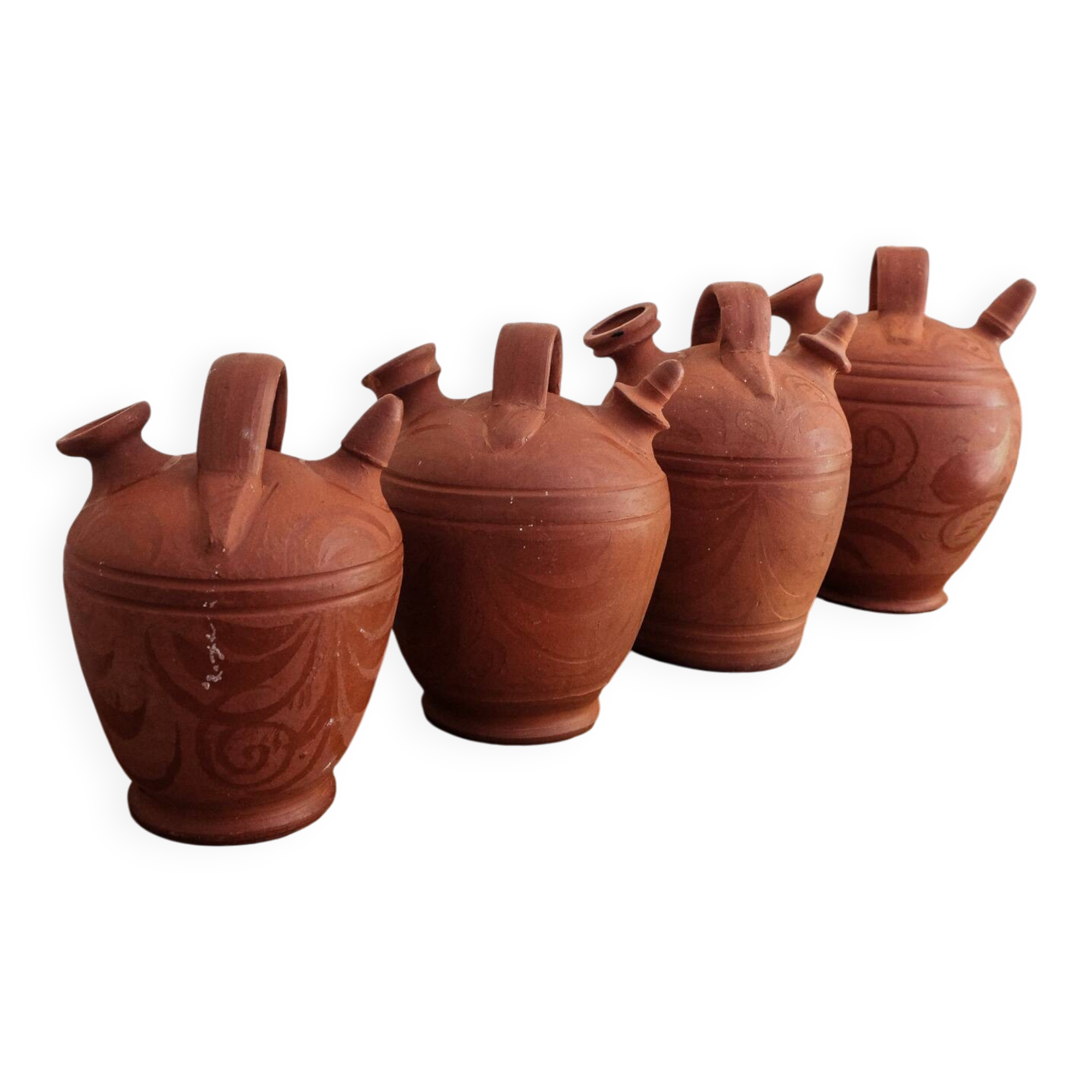 Set of 4 terracotta jugs