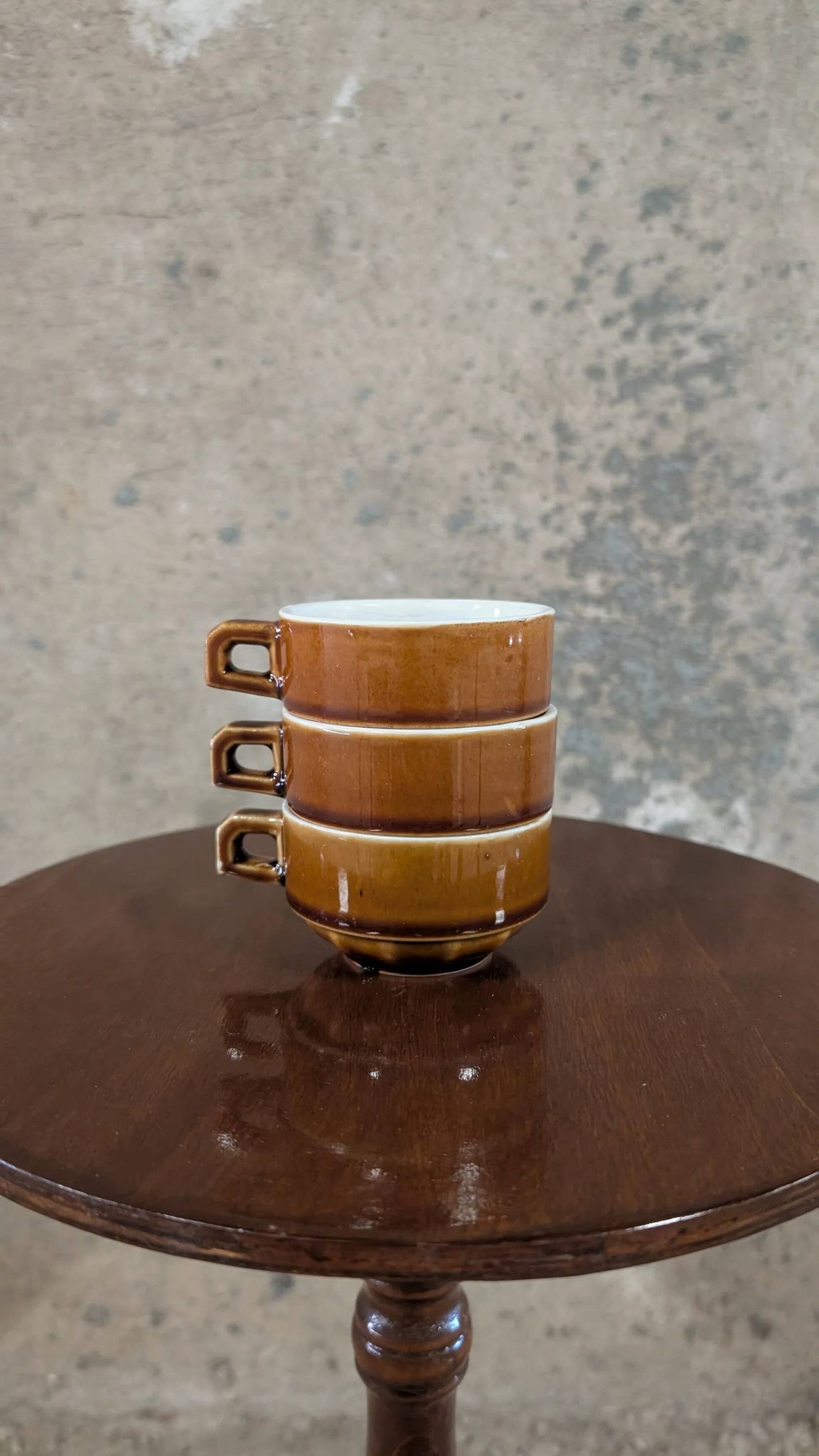 Trio of brown stoneware cups